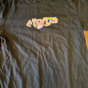 A medium T-shirt with a bunch of graphics on it and it looks really cool